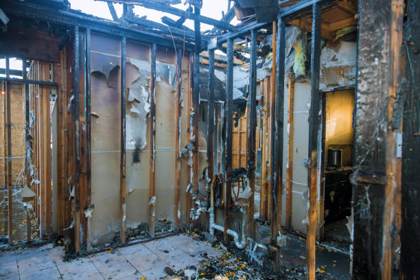 Professional Fire Damage Restoration technician working in Greenville, RI